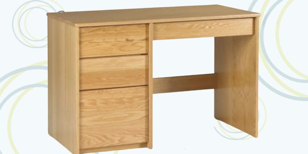 A small wooden desk with drawers, offering functionality and durability for study and administrative tasks within shelters.