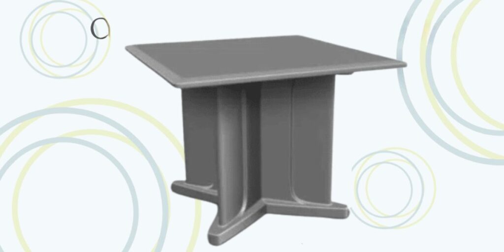 Gray square table with a circular base, designed for durability and safety in group homes, meeting CAL 117 fire resistance standards.