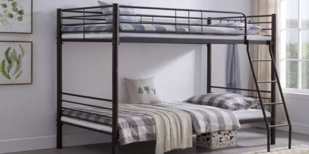 Metal convertible bunk bed with a chair, designed for healthcare settings, offering stability and space-saving benefits.