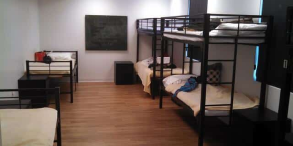 Bunk beds in a room, showcasing a space-efficient sleeping solution ideal for group homes or shelters.