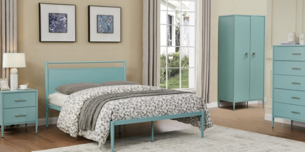 A cozy bedroom featuring a blue metal bed and dressers, ideal for practical and stylish living arrangements.