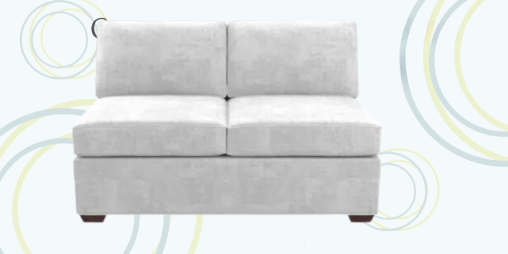 A white couch featuring a distinctive circular pattern, elegantly designed for modern living spaces.