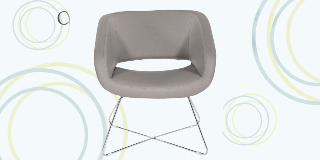 A chair with a metal frame and gray seat, designed for modern healthcare settings with integrated technology features.